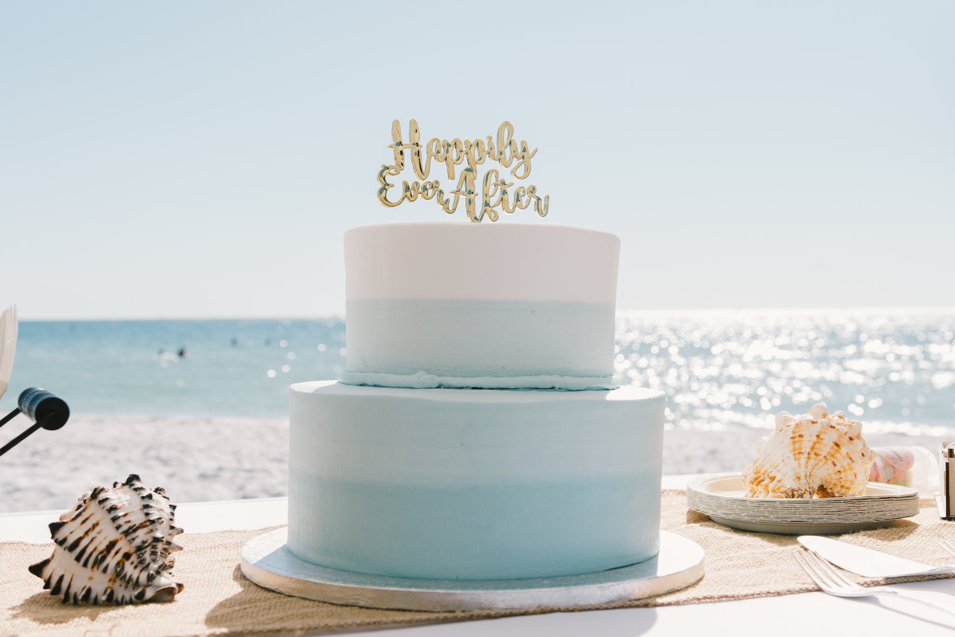 wedding cake with the sea in the background