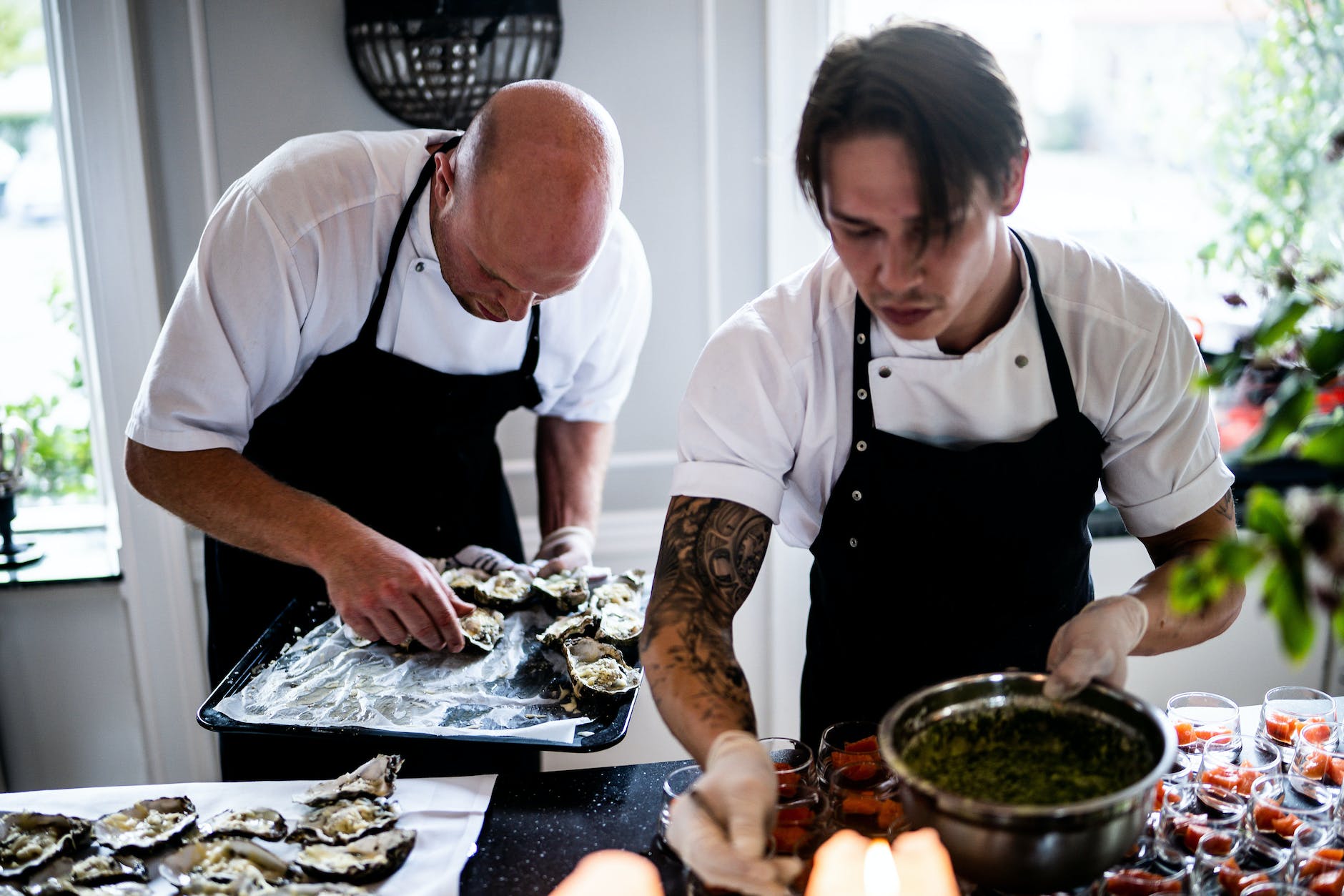 two men preparing food