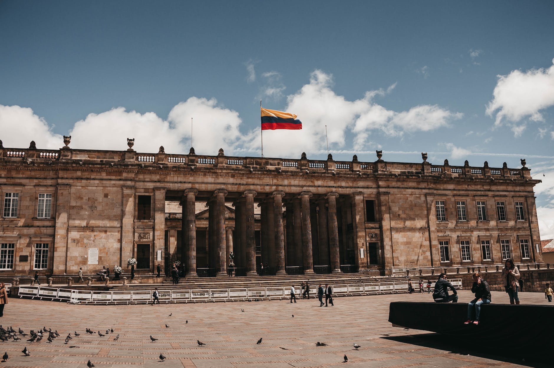 people walking at the plaza de bolivar
