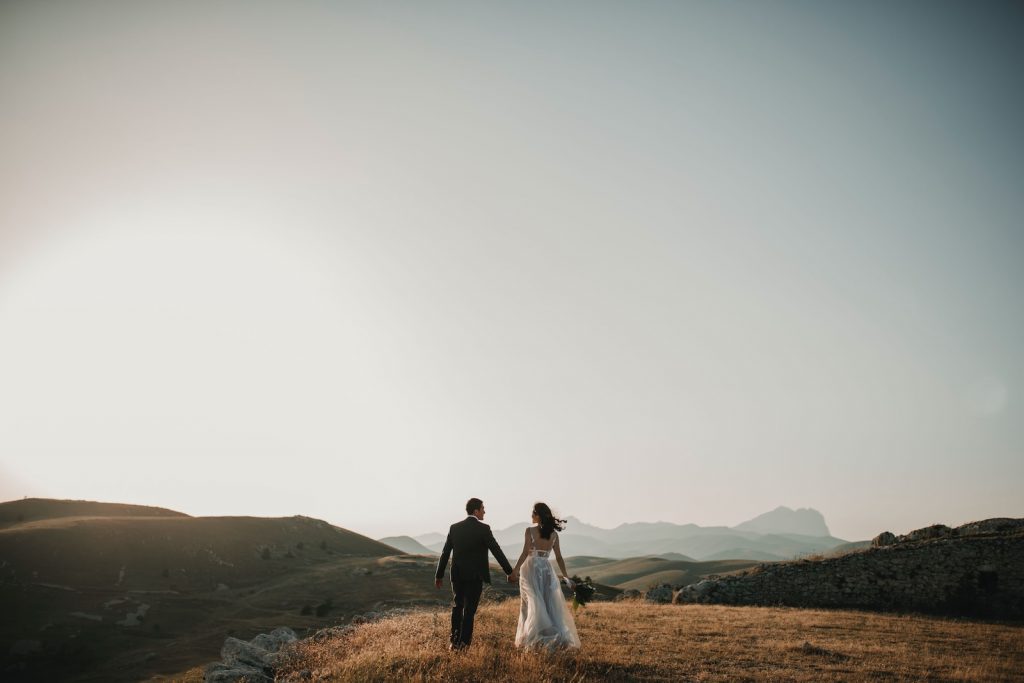 wedding inspiration ideas couple standing in field